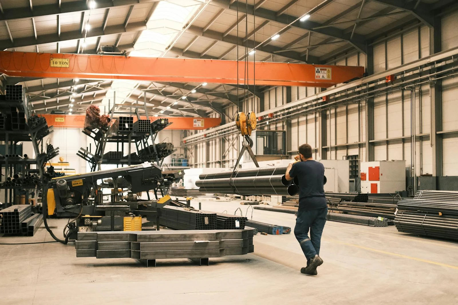 Interior of an industrial warehouse in Konya, Türkiye, showcasing heavy machinery and metalwork.